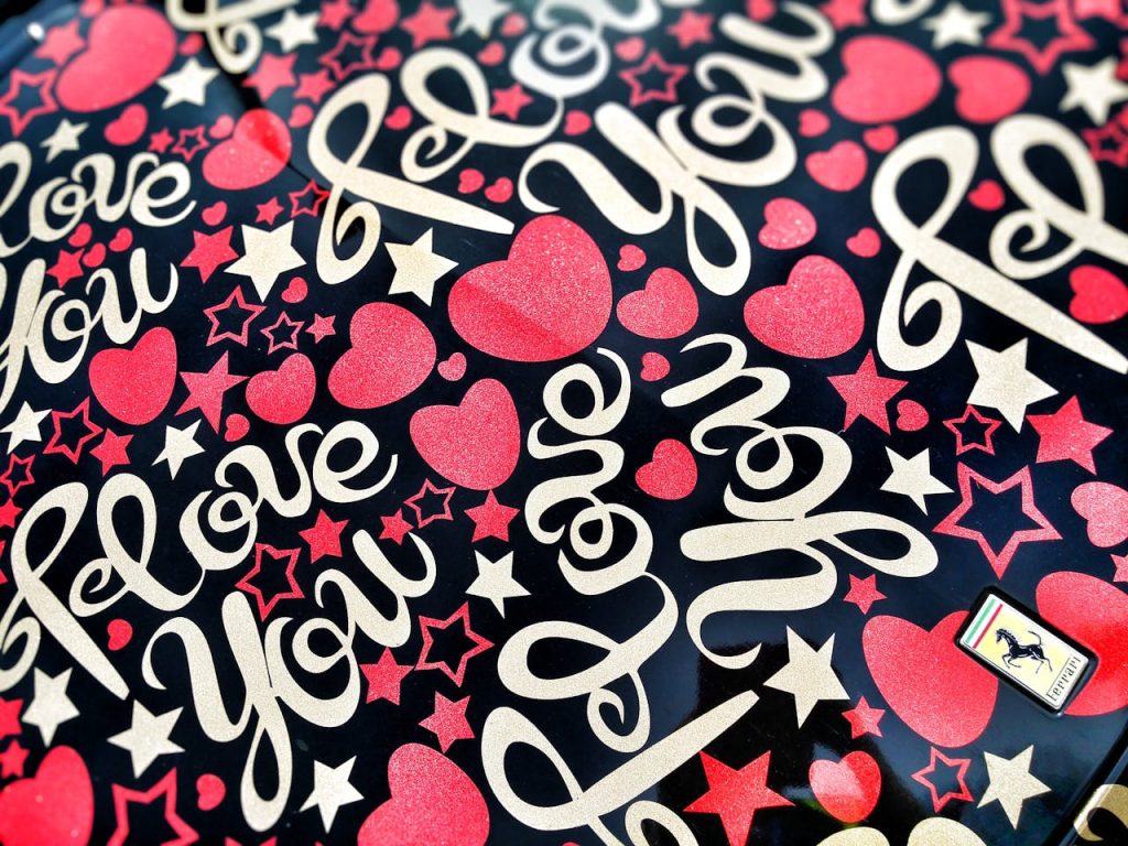 Services Vibrant love-themed wallpaper with hearts, stars, and stylish typography.